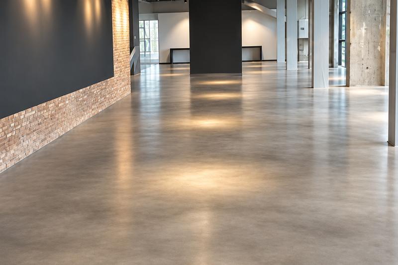 Polished concrete corridor with soft reflections
